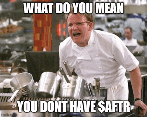 a chef is standing in a kitchen with pots and pans and making a meme .