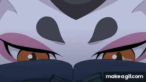 a close up of a cartoon character 's eyes with a black mask on .