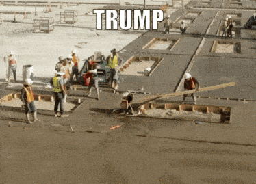 a group of construction workers are working on a concrete floor with the word trump written on it