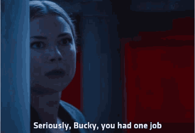 a woman says seriously bucky you had one job in a dark room
