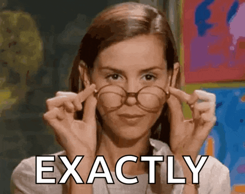 a woman is wearing glasses and has the word exactly above her head