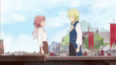 a boy and a girl are standing next to each other and looking at each other