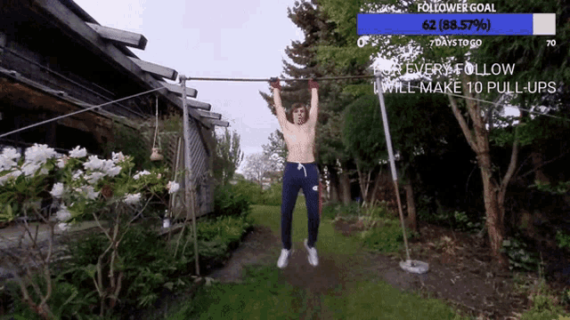 a man is doing pull ups in front of a house with a follower goal of 62