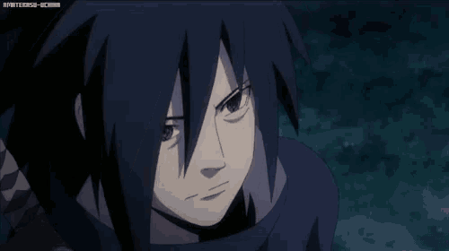 a close up of a person 's face with a caption that says ' naruto - uchiha ' on it