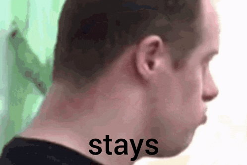 a close up of a man 's neck with the word stays written above it