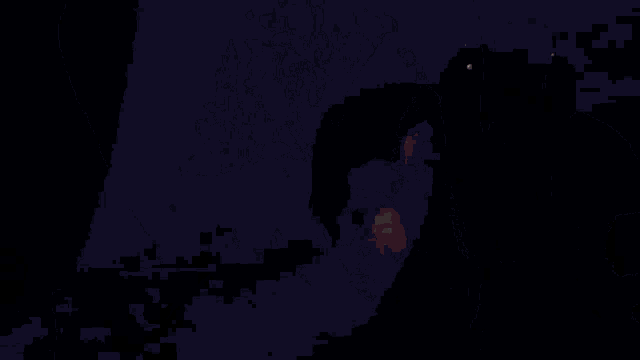a man wearing a mask with glowing red x 's on it