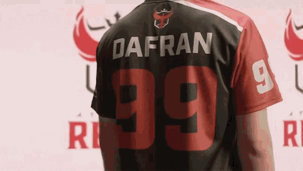 a man is wearing a jersey with the name dafran and the number 99
