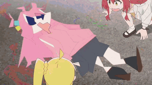 a pink flamingo is laying on the ground with a girl standing nearby
