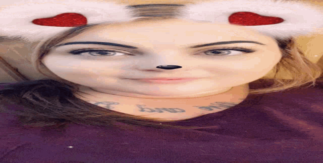 a woman with a tattoo on her neck that says " i love you "