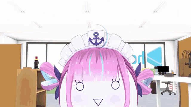 a girl with a hat with an anchor on the back of it