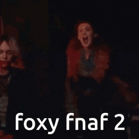 a blurry picture of a woman screaming in a dark room with the words foxy fnaf 2 .