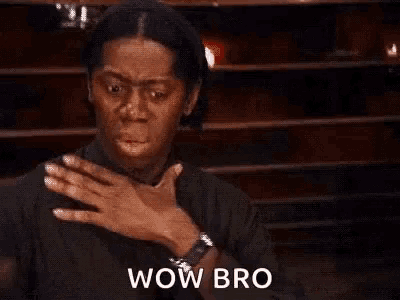 a woman in a black shirt is covering her mouth with her hands and says wow bro .