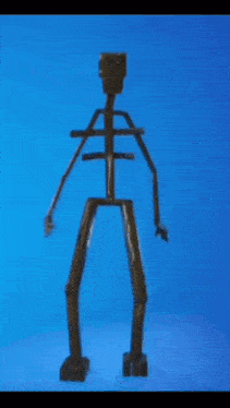 a wooden skeleton with arms and legs against a blue sky