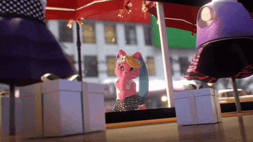 a pink doll is standing in front of a window with a red umbrella
