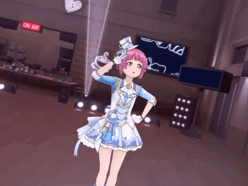a girl in a blue and white dress is standing in front of a sign that says on air