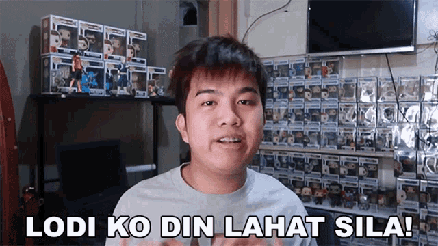 a young man says lodi ko din lahat sila in front of a shelf full of funko pop figures