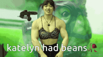 a woman in a bikini with the words katelyn had beans