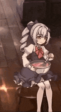 a girl is sitting on a stool holding a bowl of food with chopsticks .