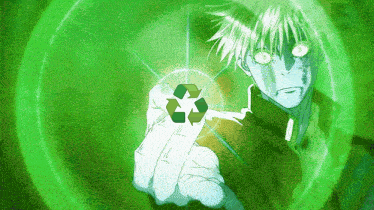 a person is holding a green recycle symbol in their hand