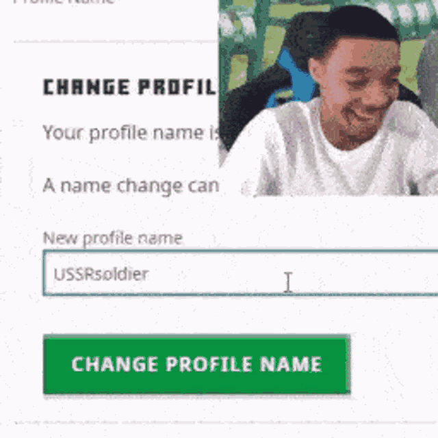 a man is smiling while looking at a change profile name button