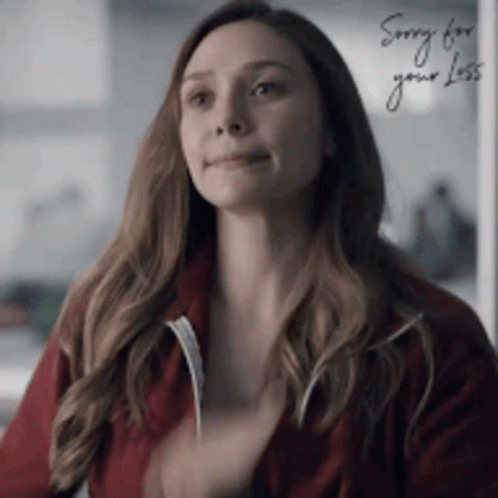 Sorry For Your Loss Smile GIF - Sorry For Your Loss Smile Elizabeth Olsen GIFs