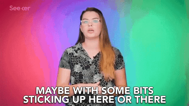 a woman wearing glasses says maybe with some bits sticking up here or there .