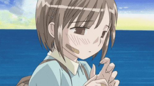 a young girl with a bandage on her face