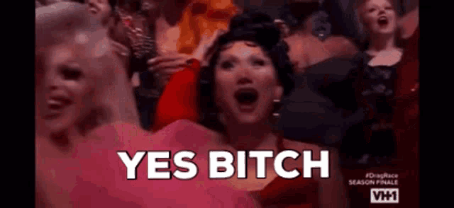 a group of women are screaming in a crowd and the words yes bitch are written in white letters .