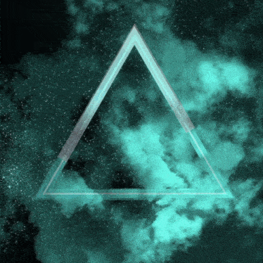 a triangle is surrounded by a cloudy sky