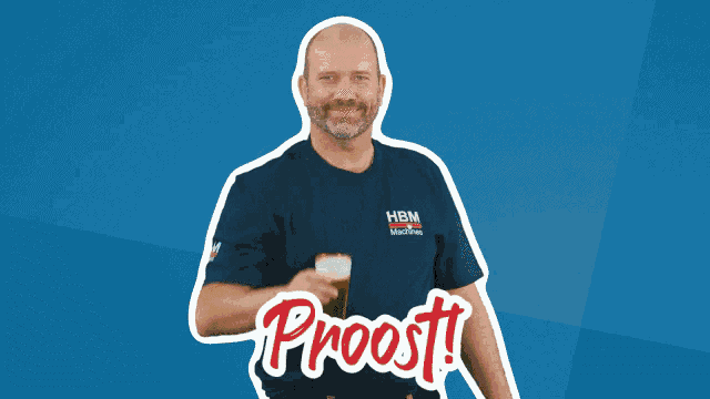a man in a hbm machine shirt holds a beer