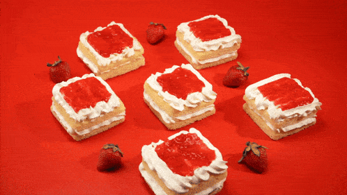 a slice of cake with whipped cream and strawberry jam on top