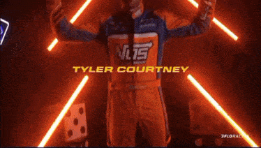 tyler courtney is wearing an orange jacket with sunshine written on it
