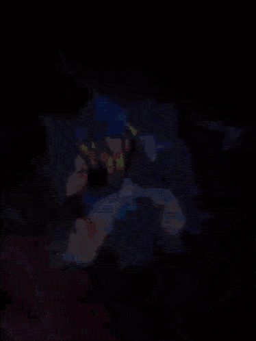 a cartoon character with blue hair is flying through the air in a dark room