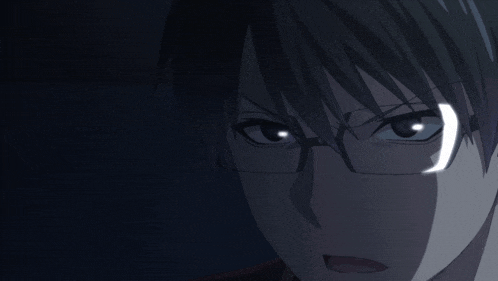 a close up of a person 's face with a glowing eye
