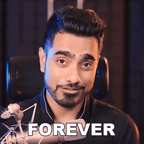 a man in front of a microphone with the word forever written on it