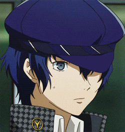 a close up of a person wearing a blue hat with a y on it