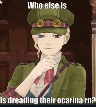 a picture of a girl in a green hat with the caption " who else is is dreading their ocarina rn "