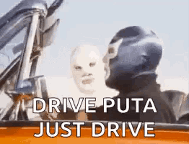 a man in a mask is driving a car with another man in a mask .