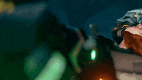 a man with a beard is wearing a helmet and holding a torch