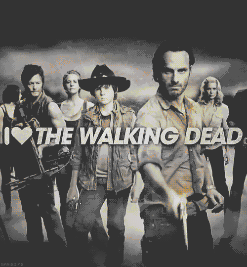 a group of people standing next to each other with the words i love the walking dead
