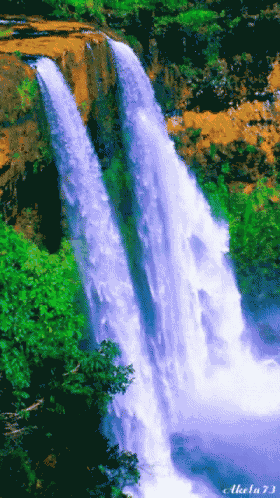 a picture of a waterfall with the number 73 on the bottom right