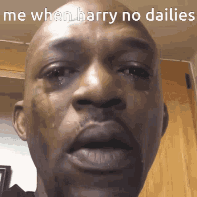 a close up of a man 's face with a caption that reads me when harry no dailies