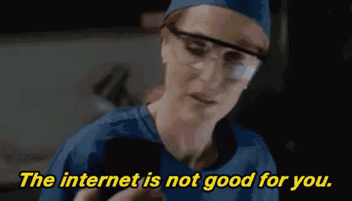 a woman in a surgical gown and safety glasses says the internet is not good for you