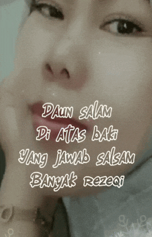 a close up of a woman 's face with daun salam di atas kaki yang jawab salam banyak rezeki