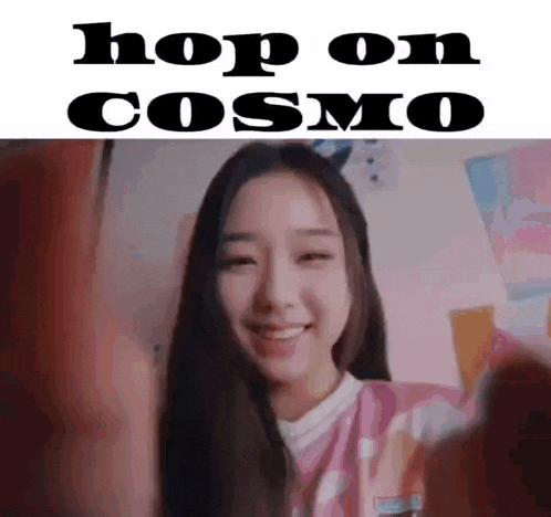 a girl with long hair is smiling and looking at the camera with the words `` hop on cosmo '' written above her .