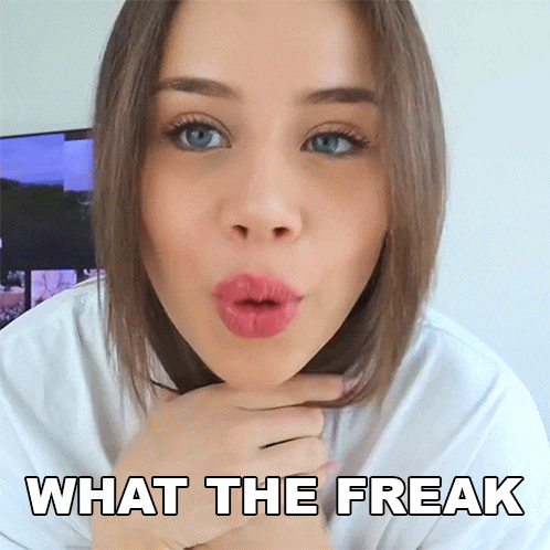 a woman blowing a kiss with the words what the freak written below her