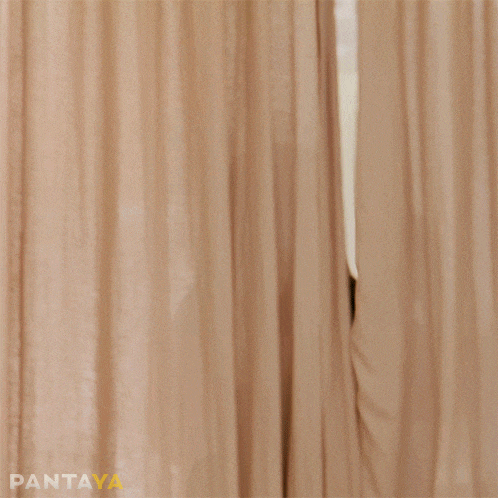a woman peeking out from behind a curtain with the word hijita in white