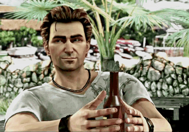a man in a white shirt is holding a red bottle
