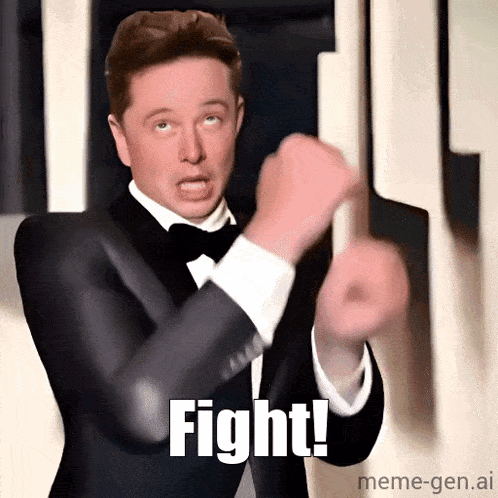 a man in a tuxedo is making a funny face and says " fight "