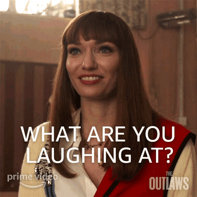 a poster for the outlaws shows a woman smiling